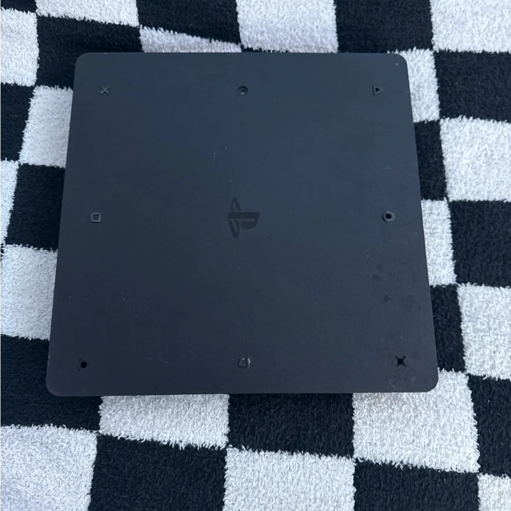 Sony PS4 Console - Black Comes with a Orange and Navy blue controller.